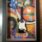 Quadro Woodstock Jimi Hendrix com Mini Guitarra