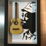 Quadro Milton Nascimento com Mini Violo Txai